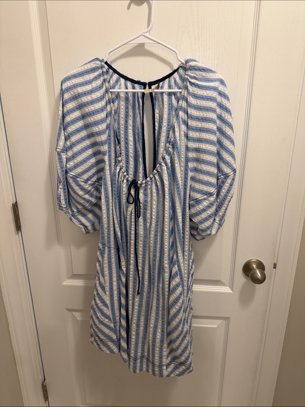 Free People “Bop Around Romper”